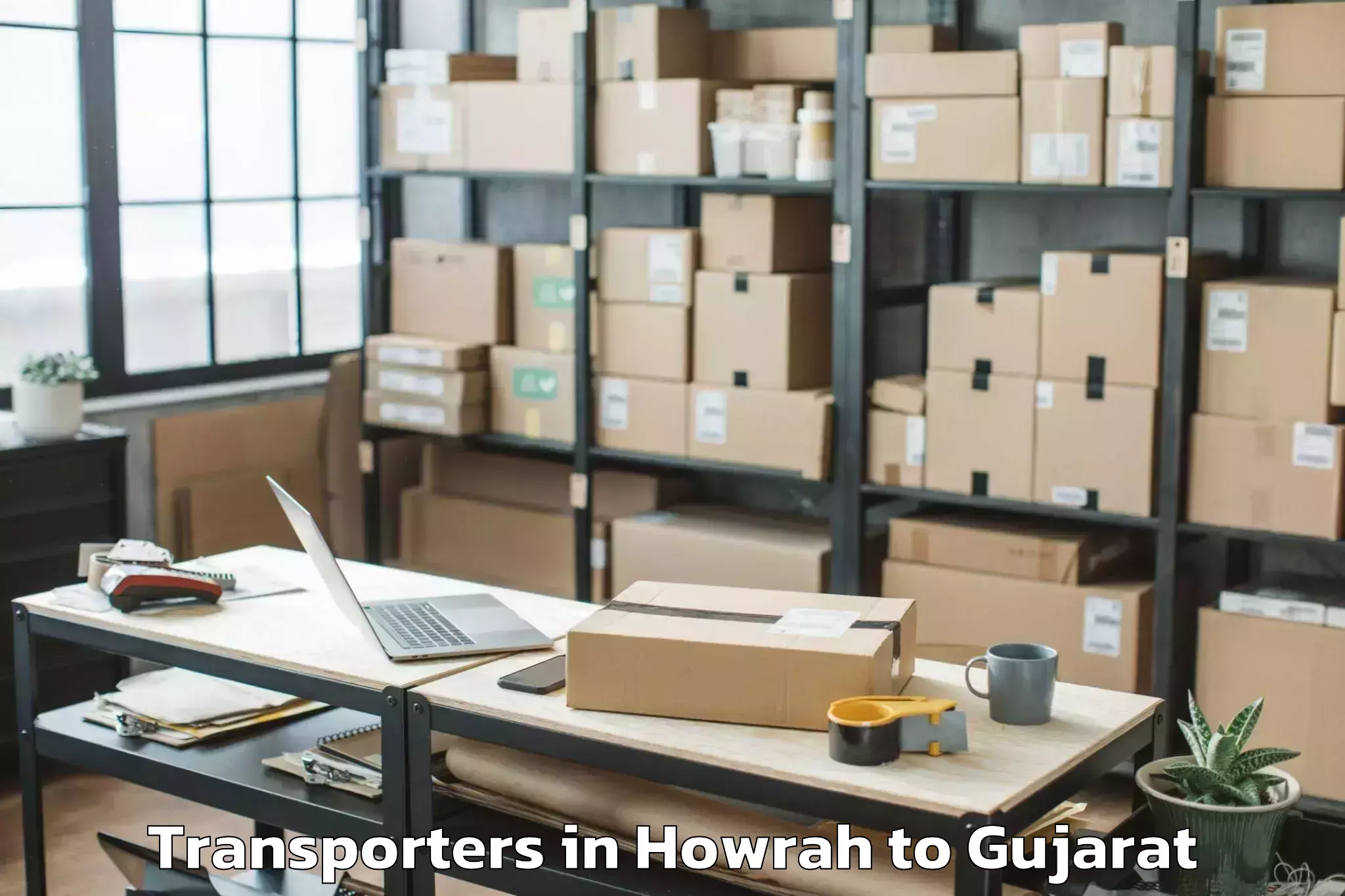 Book Howrah to Wankaner Transporters Online